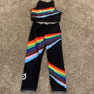 Peloton Black Leggings with Rainbow Stripes reverses to grey